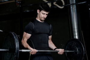 Do Diet and Exercise Affect Your Eye Health? Man lifting weights